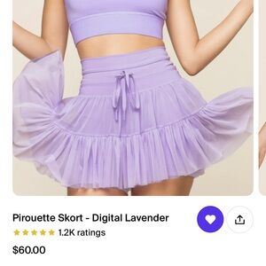 POPFLEX Digital Lavender Skort Sz L

Worn once
Stock photo top not included.